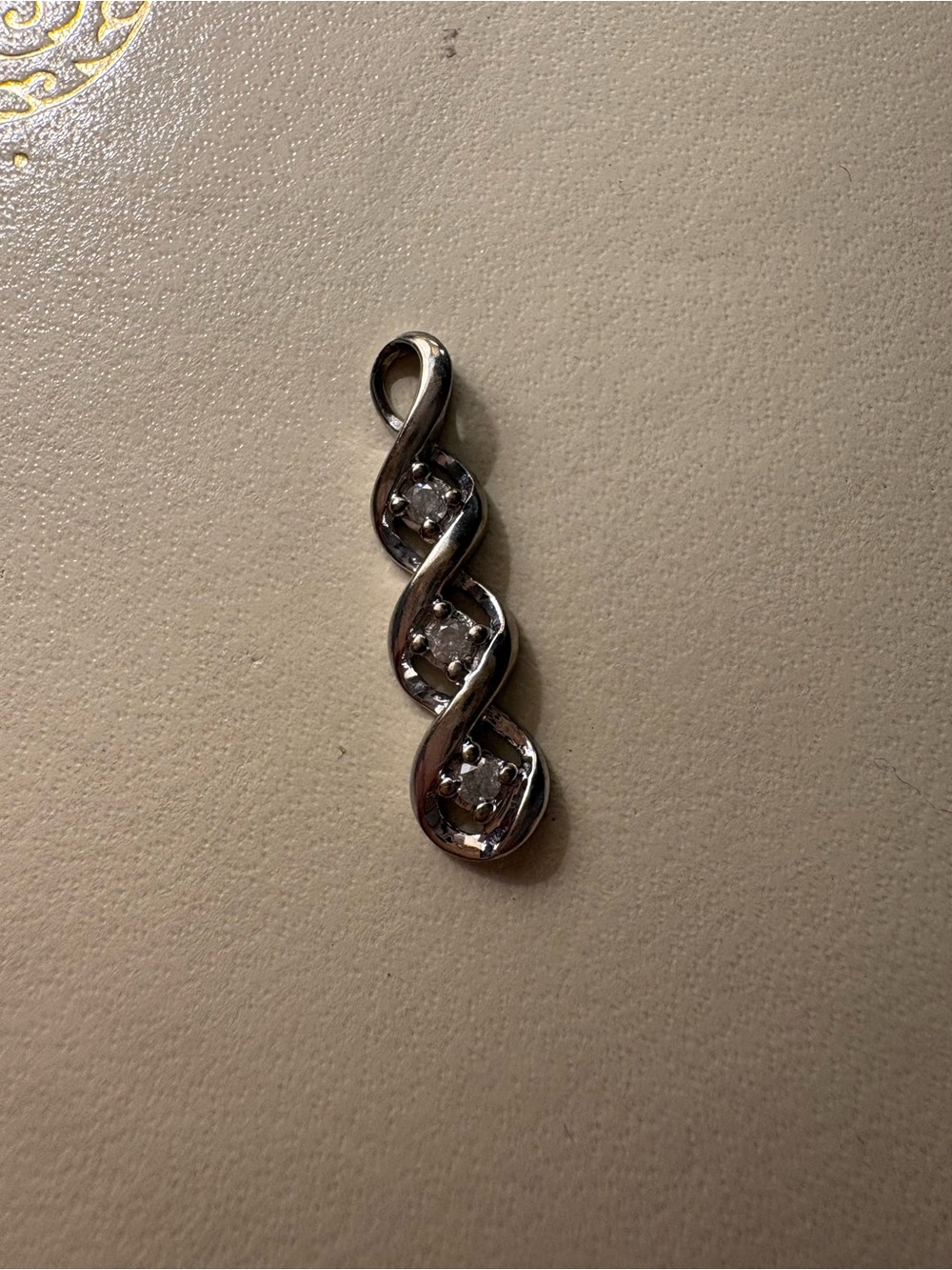 10k White Gold Twisted Drop Pendant with Three Diamonds